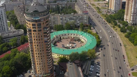 Interesting round shape of the building with a green roof Stock Footage 126160118