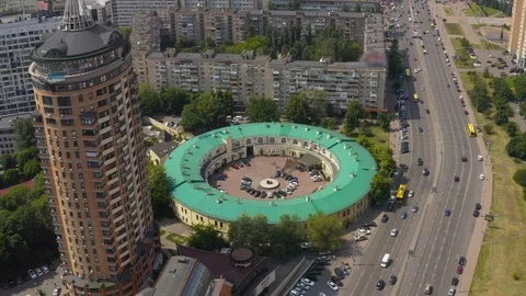 Interesting round shape of the building with a green roof Stock Footage 126160238