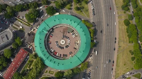 Interesting round shape of the building with a green roof 스톡 동영상 126160724