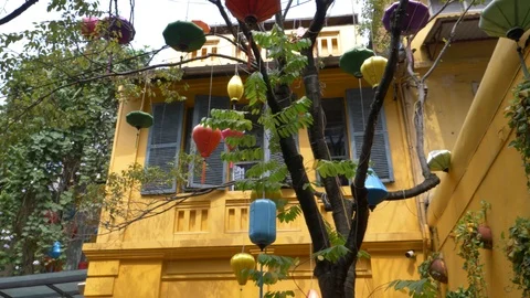 Interesting yellow building with lanterns Stock Footage 108724434