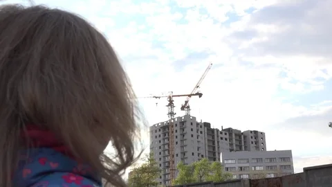 Interesting Young Lady Looking an Building Cran Working. 4K UltraHD, UHD Stock Footage 82678364