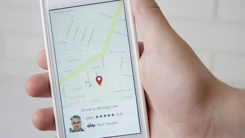 Interface of car sharing application. Man arrives to pick up his passenger. Man Stock Footage 77413595