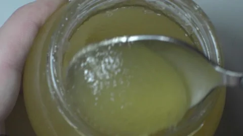 Interfere Honey Spoon Stock Footage 58272820