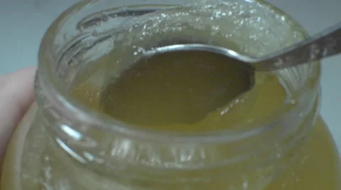 Interfere Honey Spoon Stock Footage 58272825