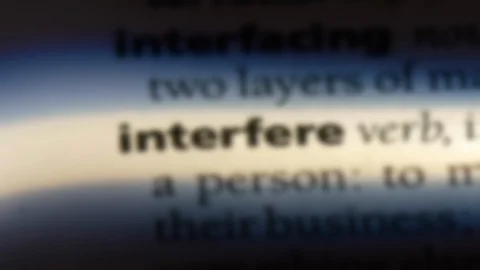 Interfere word in a dictionary. Stock Footage 99561458