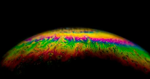 Interference of equal thickness soap bubble light reflected in all colours Stock Photos