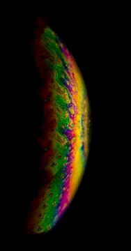Interference of equal thickness soap bubble light reflected in all colours Stock Photos