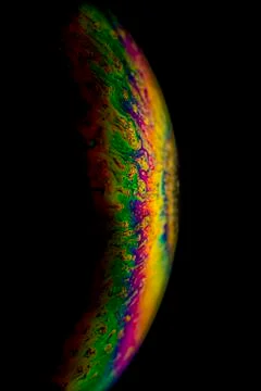 Interference of equal thickness soap bubble light reflected in all colours Stock Photos