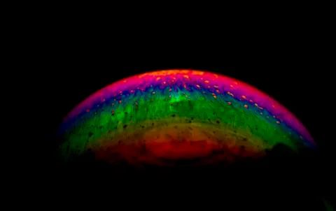 Interference of equal thickness soap bubble light reflected in all colours Stock Photos