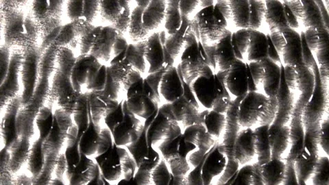 Interference patterns create dynamic structure in a wave tank. Stock Footage 144631199