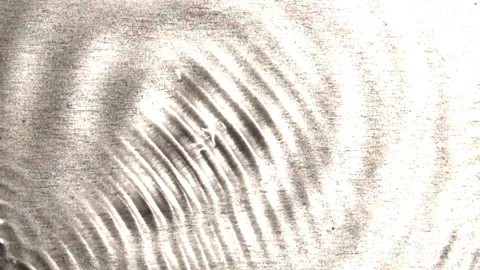 Interference patterns form as two wave patterns intersect and become more Stock Footage 144631161