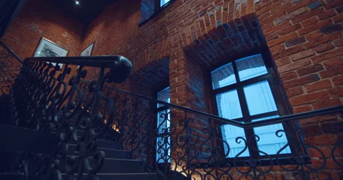 Interfloor span and staircase of a new brick building in the old classic style  Stock Footage 119561482