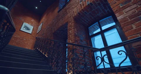 Interfloor span and staircase of a new brick building in the old classic style  Stock Footage 119561564