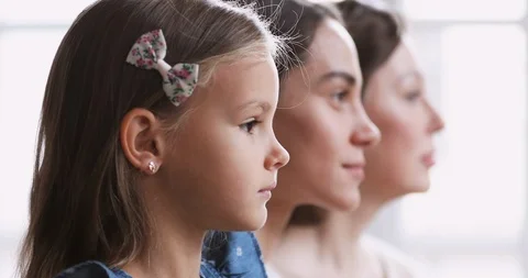 Intergenerational 3 three generations women family profile side portrait Stock Footage 125531276