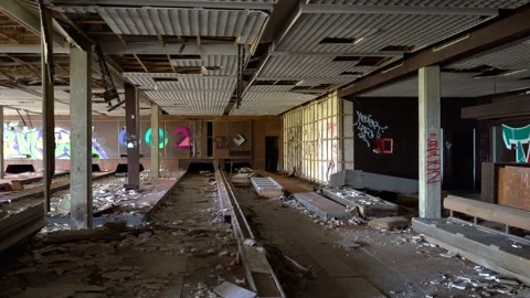 Interior of an abandoned and destroyed luxury hotel Palace Haludovo Stock Footage 241406052