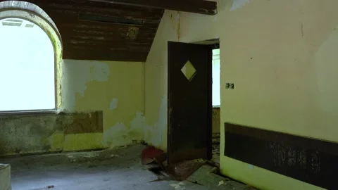The interior of an abandoned and dilapidated hotel Stock Footage 227900630
