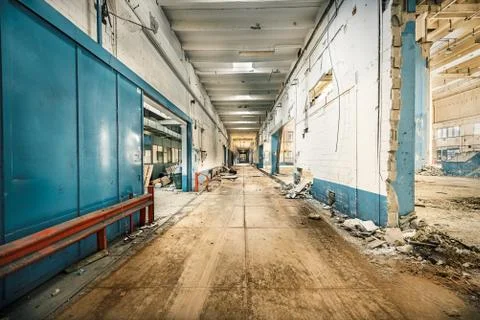 Interior of abandoned industry with dirt and rusty thinghs Stock Photos