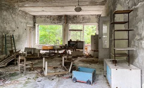 Interior of an abandoned kindergarten in the Pripyat ghost town, Chernobyl ex Stock Photos