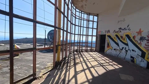 Interior of the abandoned Petrova Gora monument with graffiti and broken windows Stock Footage 331236005