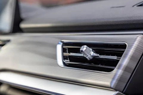 Interior air duct on the front panel of a premium car Stock Photos