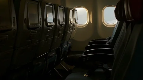 Interior of Airplane during flight without Passengers Stock Footage 87634204