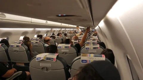 Interior Of Airplane With Passengers On Seats Stock Footage 92234337