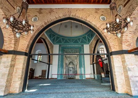 Interior of Alaeddin Mosque with intricate tilework and chandeliers in Konya, Stock Photos