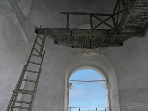 Interior of an ancient bell tower of an Orthodox church. 库存照片