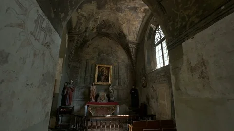Interior Of Ancient Temple. Sun's Rays Illuminate The Icons And Ancient Frescoes Stock Footage 110746542