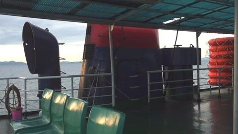 Interior and engine view on second floor on the ferry boat during sunrise Video stock 95850927