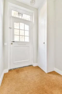 Interior of apartment with entrance door Stock Photos