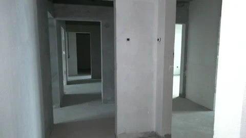 Interior of the apartment without decoration in gray colors. Stock Footage 216453819