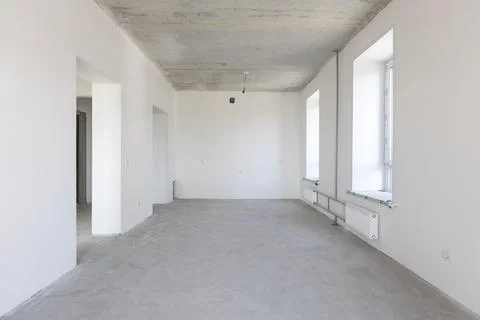 Interior of the apartment without decoration in gray colors Stock Photos