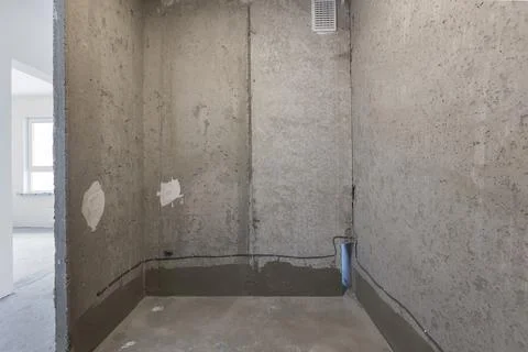 Interior of the apartment without decoration in gray colors Stock Photos