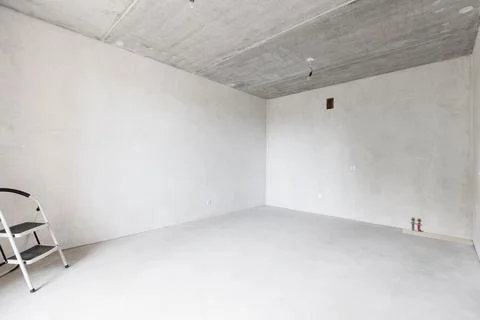 Interior of the apartment without decoration in gray colors Stock Photos