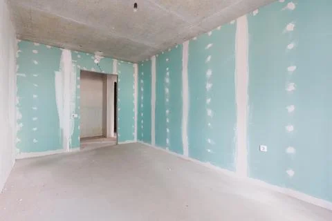 Interior of the apartment without decoration in gray colors Stock Photos