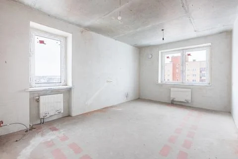 Interior of the apartment without decoration in gray colors. rough finish Stock Photos