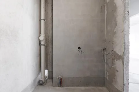 Interior of the apartment without decoration in gray colors. rough finish Stock Photos