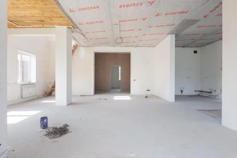 Interior of the apartment without decoration in gray colors. rough finish Stock Photos