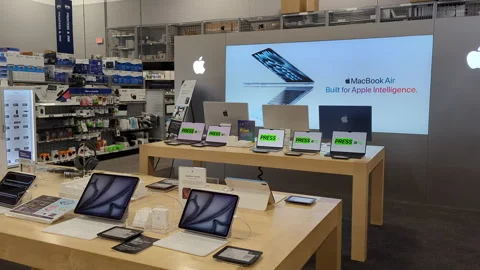 Interior of Apple Store With Customers. Customers Browsing, Trying and Buyi.. Stock Footage 316847667