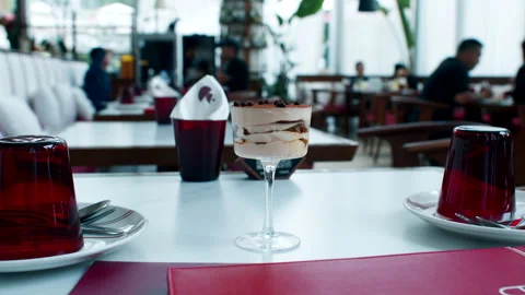 Interior atmosphere of a modern restaurant or cafe with focus on the dining Stock Footage 337151064