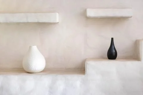 Interior backdrop with black and white vase vintage decorate at home backgrou Stock Photos