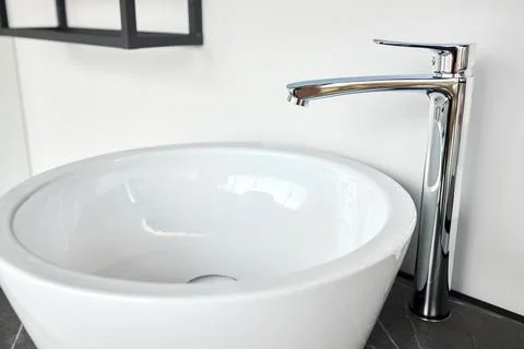 Interior of bathroom with white ceramic round washbasin and faucet. Bathroo.. Stock Photos
