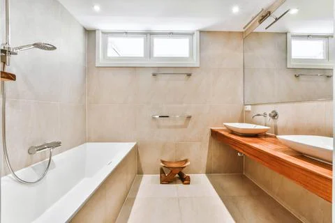 The interior of a beautiful bathroom with a window Stock Photos