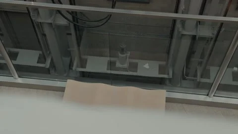 Interior Bench and Elevator Cable Revealed in Backward Glide Stock Footage 341856579