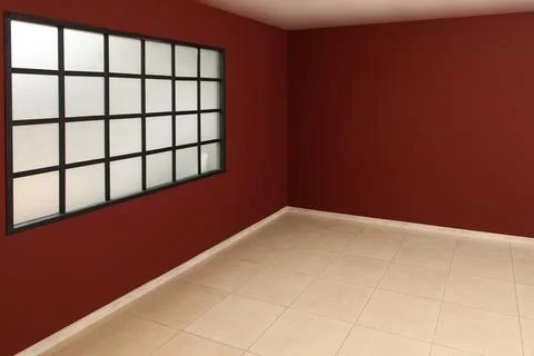 Interior of big empty room with window near burgundy wall Stock Photos