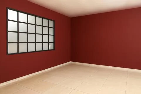 Interior of big empty room with window near burgundy wall Stock Photos