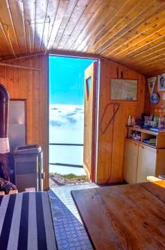 Interior of the bivouac in the mountains Stock Photos