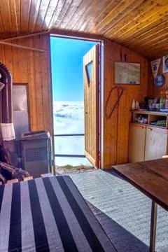 Interior of the bivouac in the mountains Stock Photos