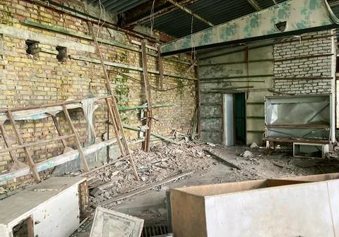 The interior of a building destroyed after hostilities, fires and accidents in Stock Photos